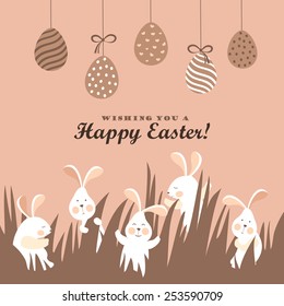 Easter bunnies and easter eggs. Vector illustration