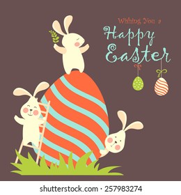 Easter bunnies and easter eggs. Vector illustration