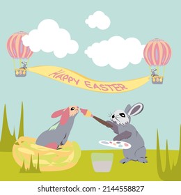Easter bunnies fly across the sky sky with rainbow in a balloon among the clouds and hold a banner stretched in the sky with the inscription Happy Easter. One bunny paints another bunny with pastel co