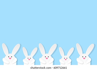 Easter bunnies on blue background. Vector illustration.