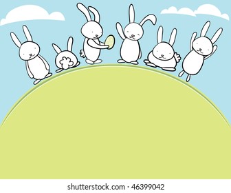 Easter bunnies on a hill