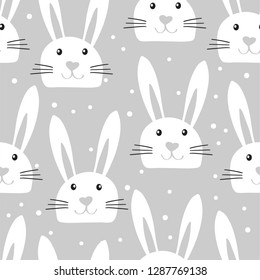 Fondo del conejo de Pascua. Patrón perfecto con rostros de conejo en estilo infantil sobre fondo gris. Ilustración vectorial para tarjetas, textiles, torres de té