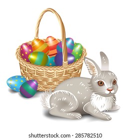 Easter bunny with basket  and colored eggs