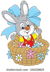 Easter Bunny in a basket with flowers