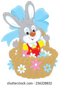 Easter Bunny in a basket with flowers