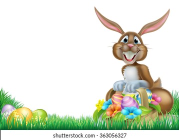 Easter bunny with a basket full of decorated chocolate Easter eggs in a field