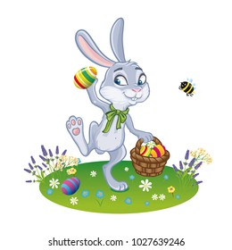 The Easter bunny with a basket full of painted Easter eggs