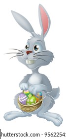 The Easter bunny with a basket full of painted Easter eggs