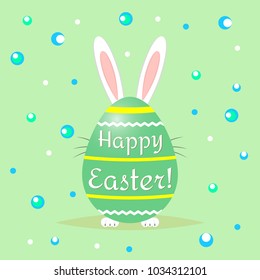 Easter bunny is behind a green decorative egg. Congratulations Happy Easter.