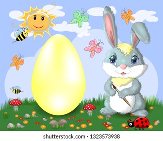 Easter bunny with a brush paints huge Easter egg on glade, the sun, butterflies, spring. Copy space