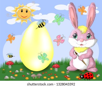 Easter bunny with a brush paints huge Easter egg on glade, the sun, butterflies, spring. Copy space