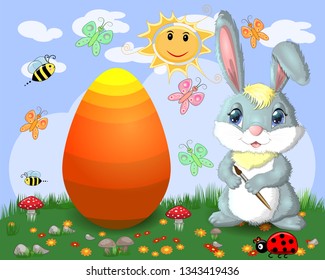 Easter bunny with a brush paints huge Easter egg on glade, the sun, butterflies, spring. Copy space