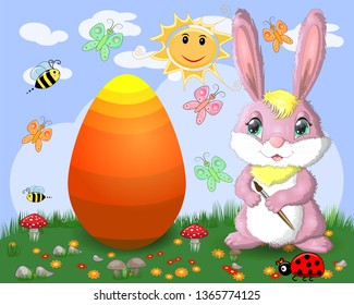 Easter bunny with a brush paints huge Easter egg on glade, the sun, butterflies, spring. Copy space