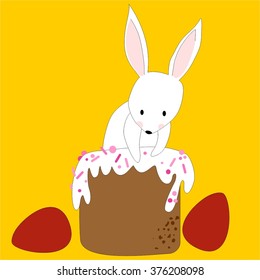 Easter Bunny with Easter cakes and eggs