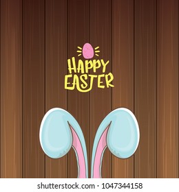 easter bunny with calligraphic text happy easter isolated on wooned background. vector easter greeting card with blue rabbits ears