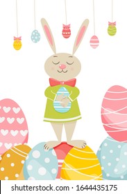 Easter bunny card design with painted eggs. Vector illustration with cute bunny boy holding an egg (for invitations and other design)