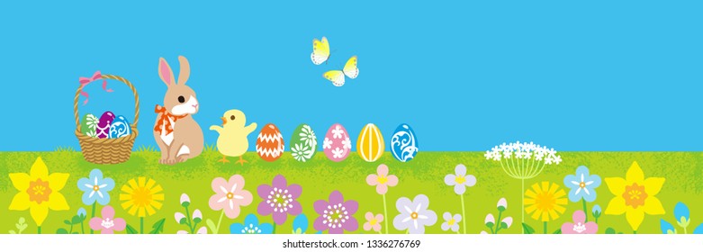Easter bunny and Chick playing in the spring nature - copy space layout design