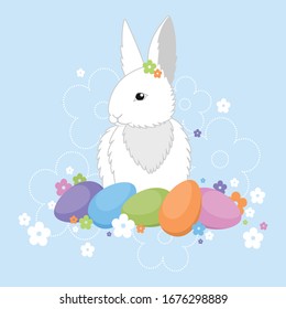 Easter bunny with colorful eggs and flowers