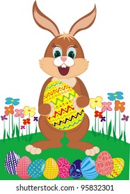 Easter bunny with colorful eggs on a flower glade