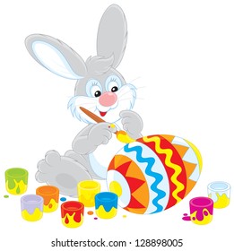 Easter Bunny decorating a big egg
