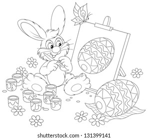 Easter Bunny drawing a decorated egg