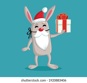 Easter Bunny Dressed Like Santa Claus Holding Gift. Cute rabbit celebrating holidays with discounted present 
