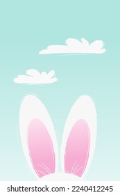 Easter bunny ears on the background of the sky and clouds	