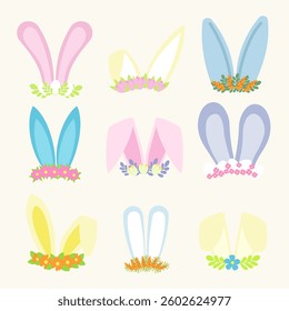 Easter bunny ears set decorated with flowers wreath, leaves, eggs and carrots