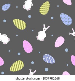 Easter bunny and eggs on dark background seamless pattern cartoon style vector illustration