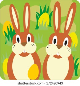 Easter bunny and eggs on grass