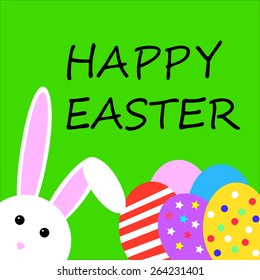 Easter bunny and easter eggs on green background