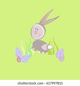 A Easter Bunny and Easter Eggs on the green background