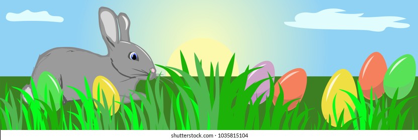 Easter bunny, eggs on a spring meadow