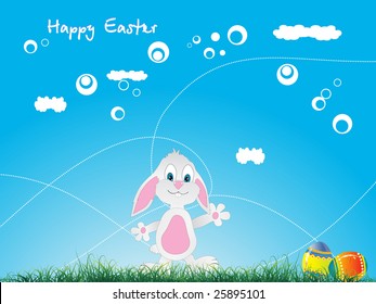 easter bunny and eggs over green grass