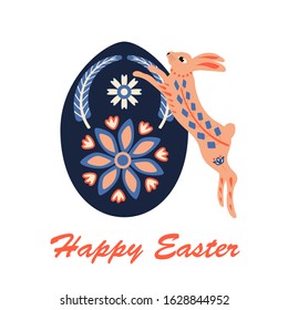 Easter bunny in the ethnic style and decorated egg. Happy Easter. Cartoon Character for Easter Holiday. Vector illustration isolated on white background.