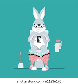 Easter Bunny hipster sits on  toilet bowl with phone in hands.  . Easter greeting card 2018