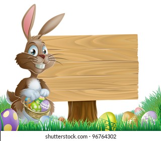 The Easter bunny holding a basket of Easter eggs with more Easter eggs around him by a wood sign board