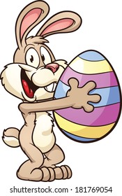 Easter bunny holding a big egg. Vector clip art illustration with simple gradients. All in a single layer. 