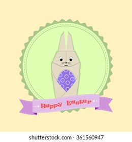 Easter Bunny holding a egg. The image is made from paper. An object with shadows on a white background. Easter with a cute Easter bunny.