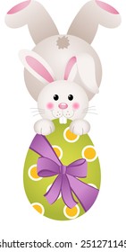 Easter bunny holding a large chocolate egg