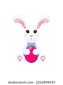 Conejo de Pascua abrazando un huevo.