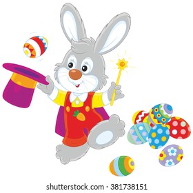 Easter Bunny illusionist with a magic wand pulling out decorated eggs from a wizard hat