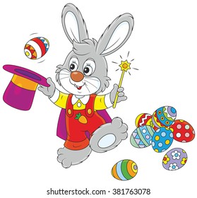 Easter Bunny illusionist with a magic wand pulling out decorated eggs from a wizard hat