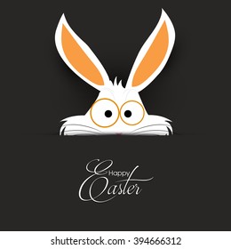 Easter bunny looking out from the pocket, happy Easter greeting card.