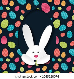 Easter bunny on background with colourful eggs. Vector.