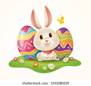 Easter bunny and Easter painted eggs on grass. Isolated. 