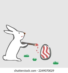 Easter Bunny painting an egg