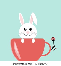 Easter Bunny in pink Coffee Cup and Flower.Greeting Card on Light Blue Background with copy space.Greeting Card and cafe