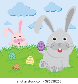Easter bunny playful with painted eggs