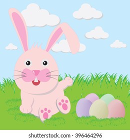 Easter bunny playful with painted eggs